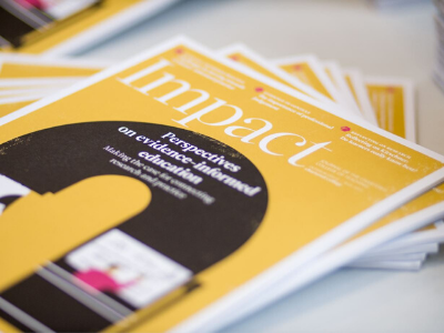 Impact Journals Spread out on a table